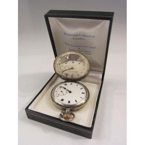 4407 - A continental silver full hunter pocket watch, Roman numerated enamel dial with second subsidiary, g... 