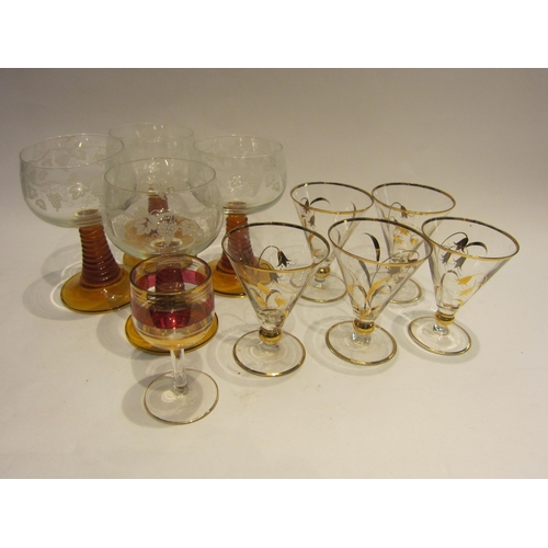 4435 - Four hock glasses etched with fruiting vine and amber coloured stems together with five 1940's glass... 