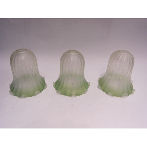 4443 - Three frosted and etched glass light shades bleeding into green, 15cm tall