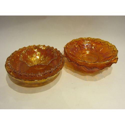 4455 - Five pieces of orange tone carnival glass