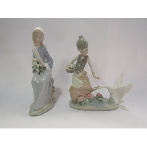 4277 - Two Lladro figural groups, girl being chased by a goose carrying a basket of eggs, 21cm tall, and a ... 