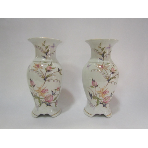 4278 - A pair of Royal Winton baluster form vases printed with flowers and butterfly, 20cm tall