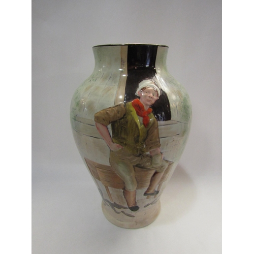 4309 - A Tams Ware baluster form jug depicting Sam Weller, 31cm tall (some paint loss to rim)