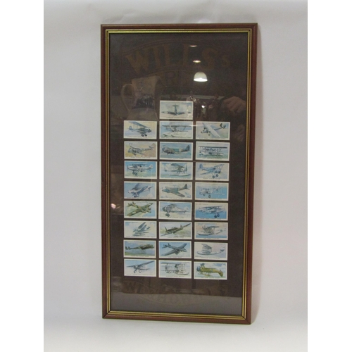 4321 - A set of W.D. & H.O. Will's cigarette cards of aeroplanes, framed and glazed, a set of framed stamps... 