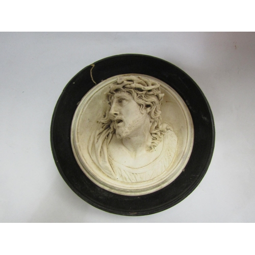 4333 - A plaster bust of Jesus Christ. Frame a/f, 19cm diameter