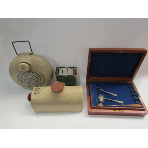 4345 - A box containing stoneware, jigsaw and canteen of assorted flatware