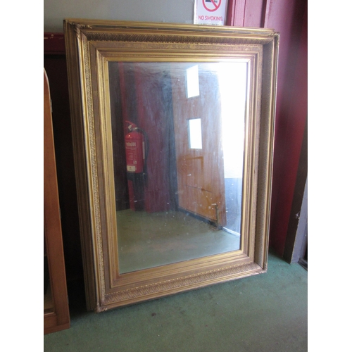 4088 - A Victorian gilt gesso wall mirror, 110cm x 85cm, later mirror plate