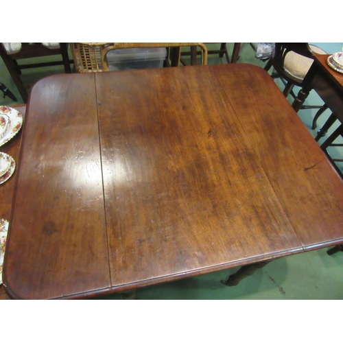 4205 - A 19th Century mahogany Pembroke table on turned legs to brass castors, 70cm tall x 111cm long x 96c... 
