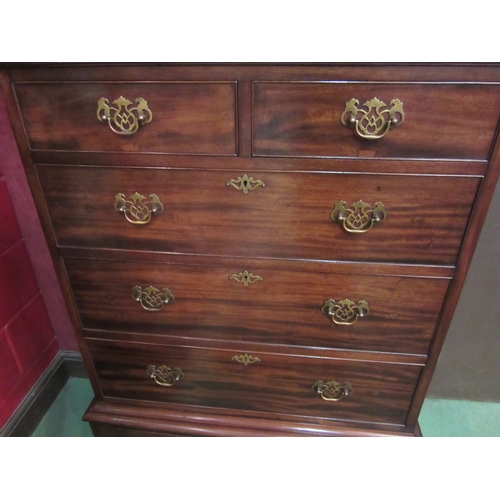4222 - A Georgian mahogany chest on stand of two short over four long drawers with shaped apron and spade f... 