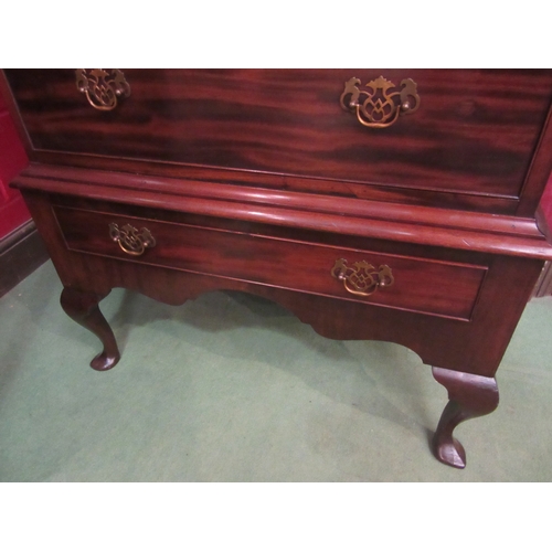 4222 - A Georgian mahogany chest on stand of two short over four long drawers with shaped apron and spade f... 