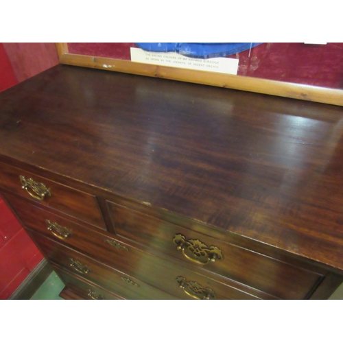 4222 - A Georgian mahogany chest on stand of two short over four long drawers with shaped apron and spade f... 