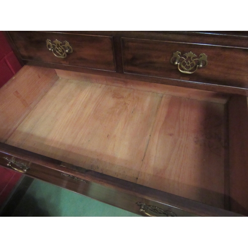 4222 - A Georgian mahogany chest on stand of two short over four long drawers with shaped apron and spade f... 