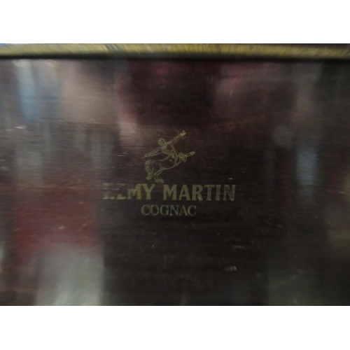 4224 - A Remy Martin Cognac mirrored tantalus with key. 32cm tall x 26cm deep X 40cm wide