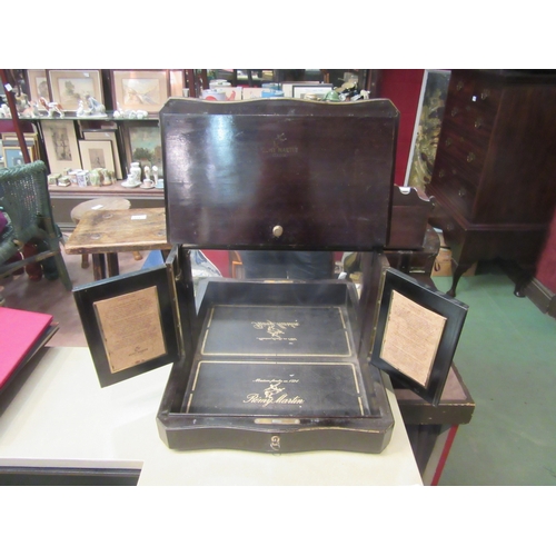 4224 - A Remy Martin Cognac mirrored tantalus with key. 32cm tall x 26cm deep X 40cm wide