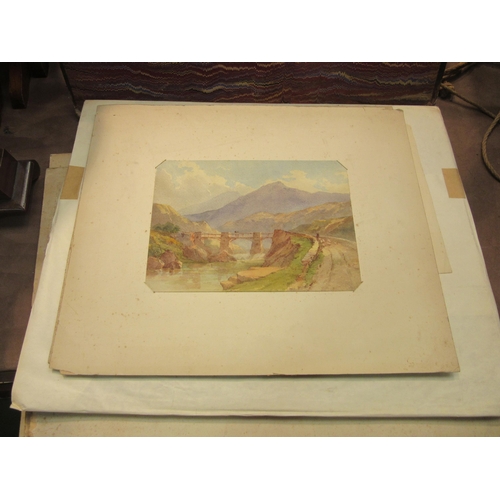 4246 - A folio containing a quantity of various artwork including watercolours of landscape scenes