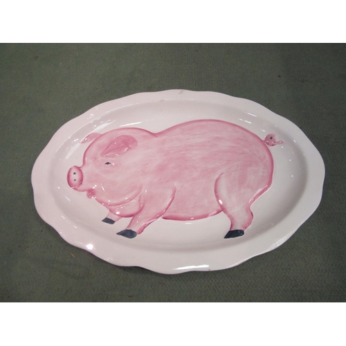 4247 - A platter embossed with pig, 48cm long