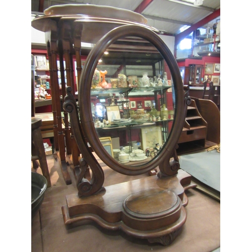 4249 - A Victorian mahogany dressing table mirror, oval with jewellery well to shaped base, 60cm tall total... 
