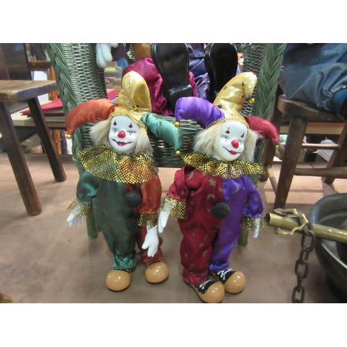 4251 - Four clowns, three with porcelain heads, the two smaller being clockwork musical, tallest 43cm
