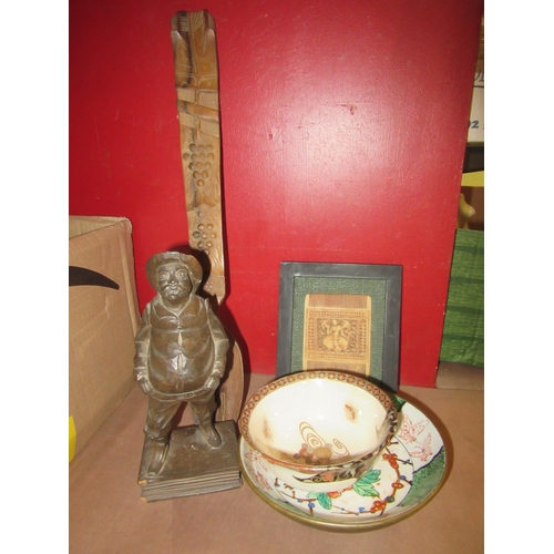 4270 - A carved wood Spanish figure on book form plinth. A carved wooden combination fork/spoon, Chinese bo... 