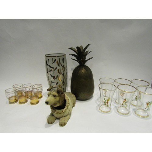 4425 - A Circa 1970s kitsch brass pineapple, retro glass vase and shot glasses together with a Centex noddi... 