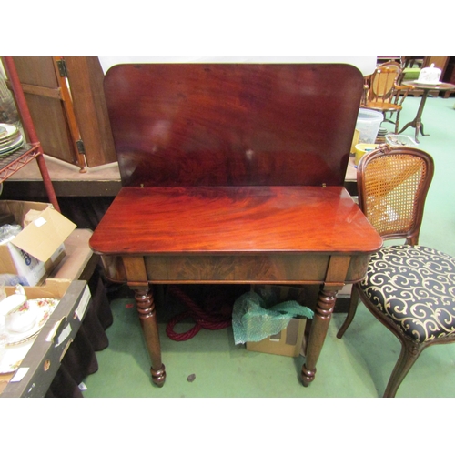 4003 - A Circa 1850 flame mahogany tea/side table the fold-over swivel top on turned and tapering legs, mis... 