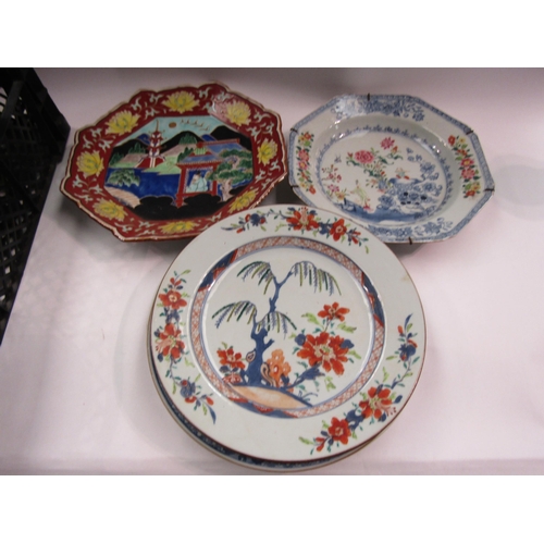 4457 - A box containing ceramics including Oriental porcelain plates, one octagonal form example, and a Spo... 