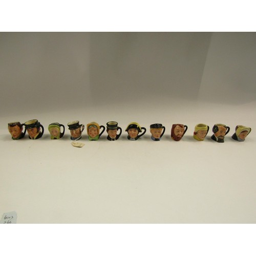 4358 - A set of twelve miniature character jugs to include 