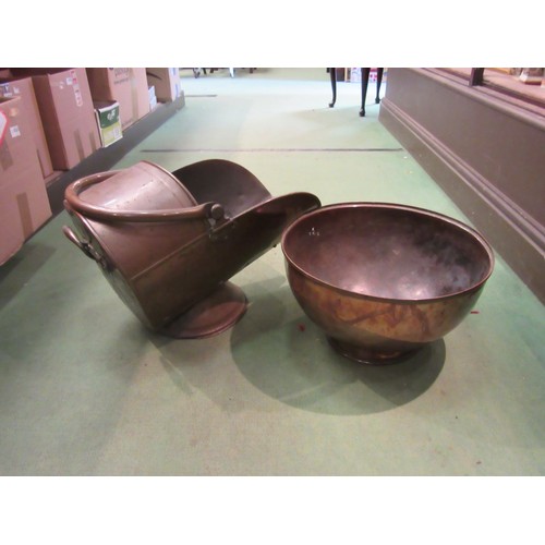 4223 - A Victorian copper coal scuttle together with an oversized copper bowl, 40cm diameter