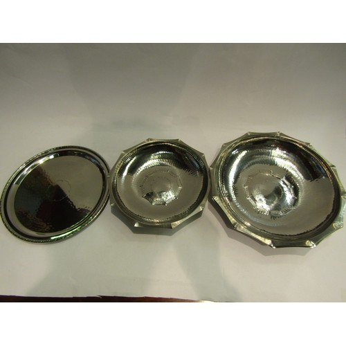 4006 - Three Lakeland Rural Industries, Borrowdale, hand beaten stainless steel bowls with piecrust rim, tw... 