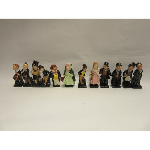 4383 - A set of twenty four Charles Dickens miniature character figures including 