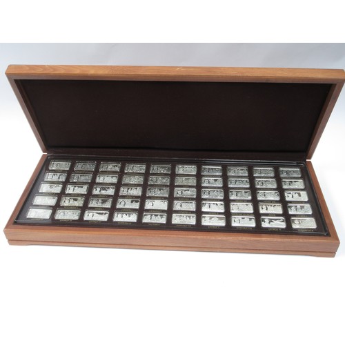 6325 - A commemorative set of 50 silver ingots celebrating '1000 years of British Monarchy', cased, Approx ... 