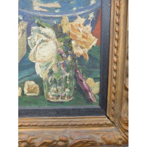 7014 - A c1930's oil on canvas still life, baskets of fruits with Oriental lamp and vase of roses. Unsigned... 