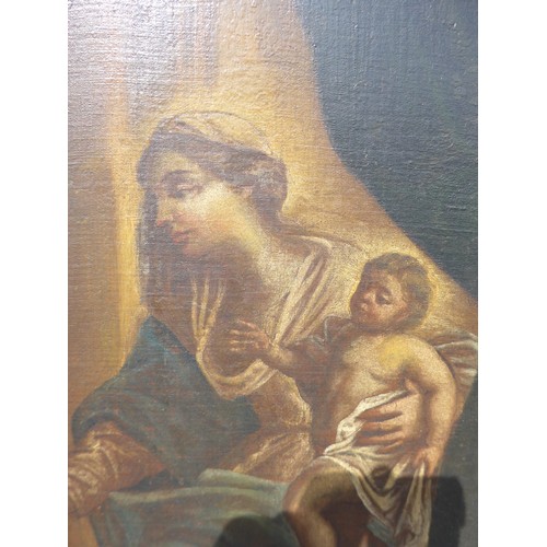 7051 - An Italian oil on canvas of Madonna and child, 56cm x 40cm, relined, gilt framed (frame a/f)