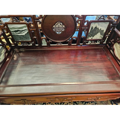 1086 - A Chinese hardwood opium daybed, scrolled back support with black and white marble panels, 140cm tal... 