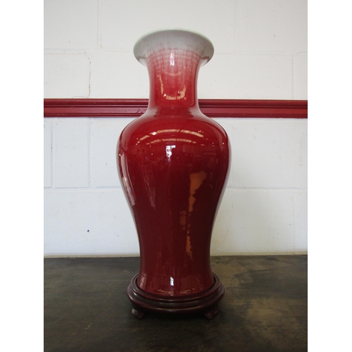 1079 - A 20th Century Chinese pottery vase with Sang de Beouf glaze. Character mark to base. 45.5cm high. S... 