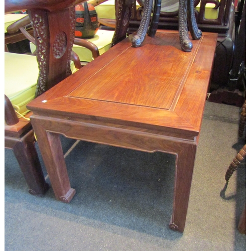 1085 - A Chinese hardwood coffee table, rectangular top, shaped frieze and supports, 48cm tall x 120cm long... 