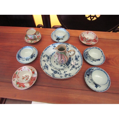 1090 - A selection of Oriental ceramics, tea bowls, plates and saucers, 19th Century jug, etc. Some a/f