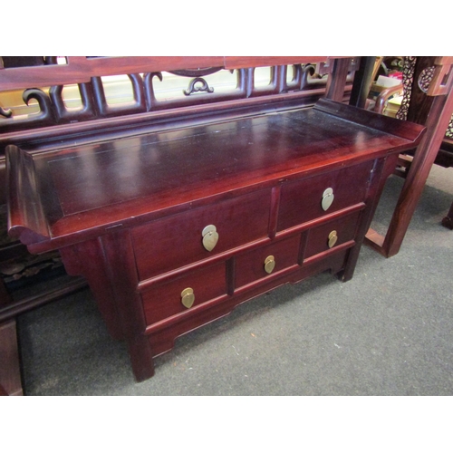 1094 - A Chinese hardwood chest of two over three short drawers, brass pendant handles, shaped frieze, 55cm... 