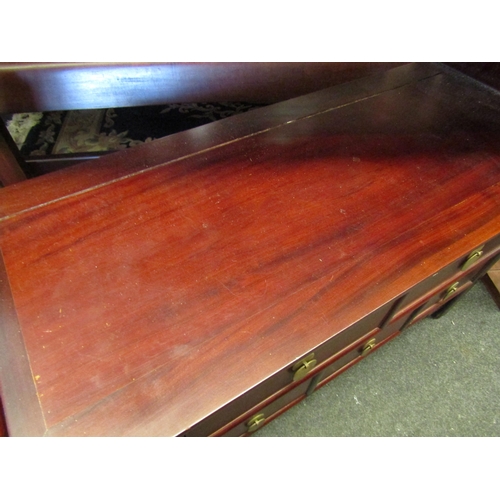 1094 - A Chinese hardwood chest of two over three short drawers, brass pendant handles, shaped frieze, 55cm... 