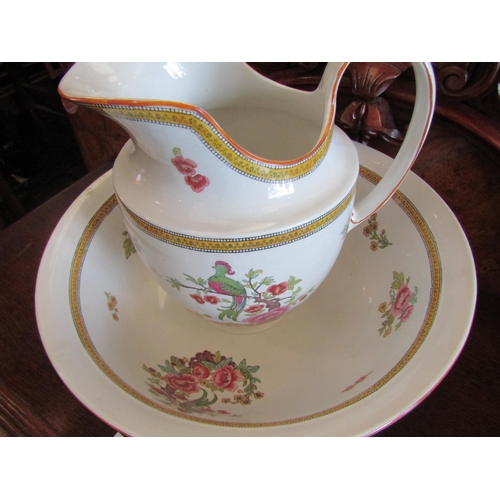 1100 - A P & Co. Ltd. jug and wash bowl set with parrot and foliate design