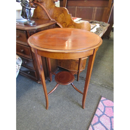 1114 - An Edwardian mahogany string inlay occasional table, 