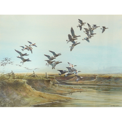 7086 - SIMON TRINDER (b.1958) A framed and glazed watercolour, 'Brent Geese over Blakeney Marsh'. Signed bo... 