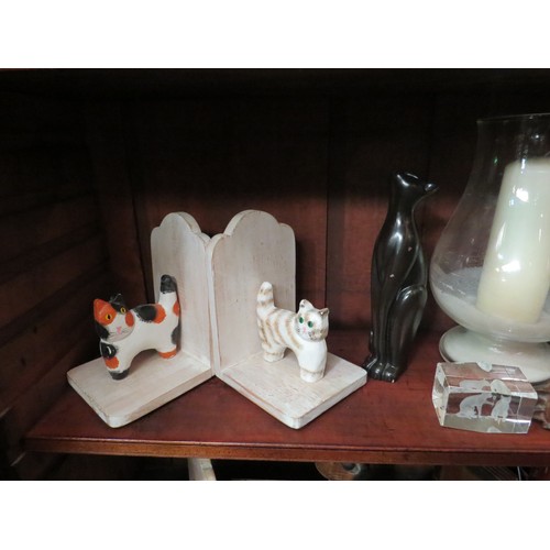 4046 - A selection of various cat figures to include book-ends, a figure of a recumbent seal on plinth and ... 