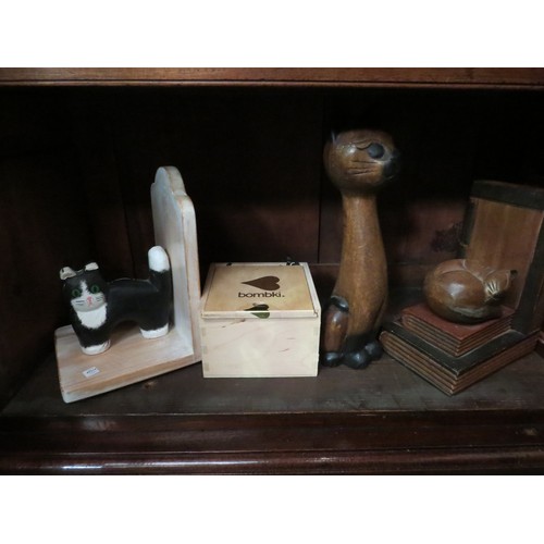 4046 - A selection of various cat figures to include book-ends, a figure of a recumbent seal on plinth and ... 