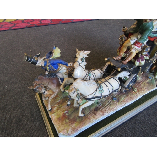 1002 - A Capodimonte style figural group of coach and horse kidnapping, on base, possibly Dresden, 29cm tal... 