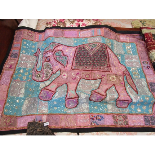 1115 - An Indian elephant design quilt, pink and blue tones with beadwork detail, 100cm x 145cm