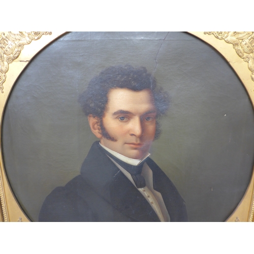 7045 - A 19th Century oil on canvas of a Gentleman. Set in a gilt frame with circular gilt mount with appli... 