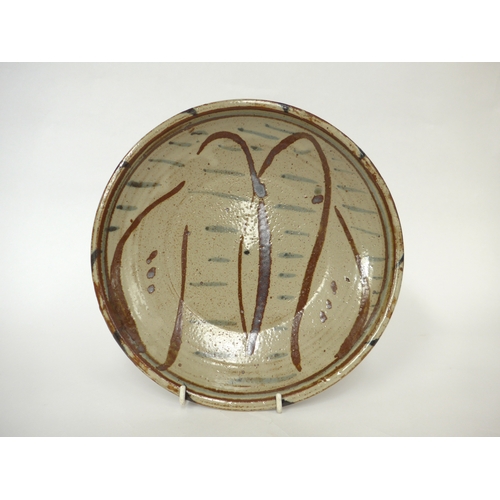 7145 - MICHAEL CARDEW (1901-1983) A Wenford Bridge Pottery shallow dish, painted waved and straight line de... 