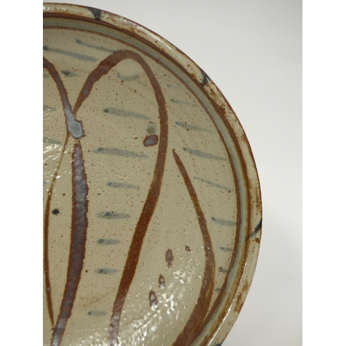 7145 - MICHAEL CARDEW (1901-1983) A Wenford Bridge Pottery shallow dish, painted waved and straight line de... 