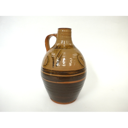 7156 - MICHAEL CARDEW (1901-1983) A Winchcombe Pottery bottle flagon with painted tenmuko detail over slip.... 